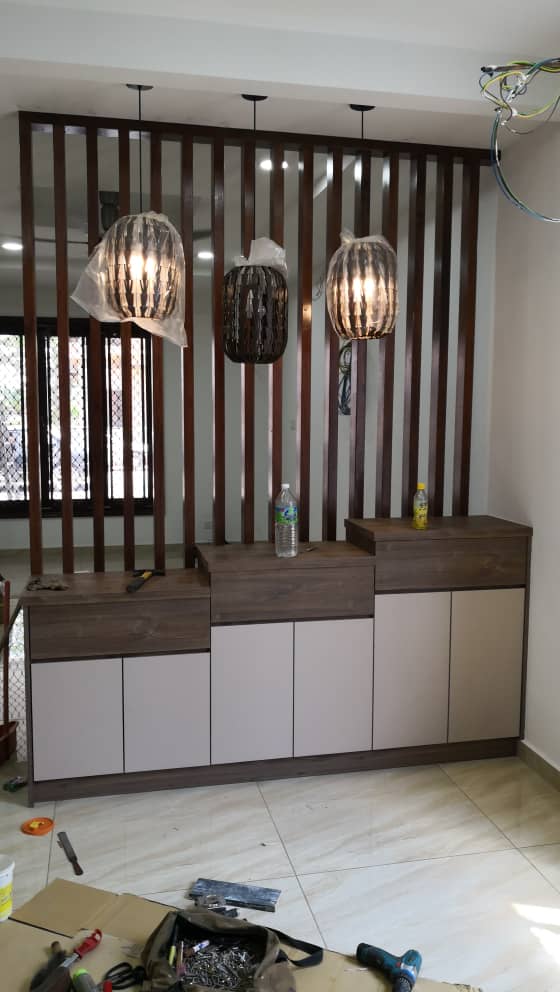 Wood slat room divider with storage sideboard