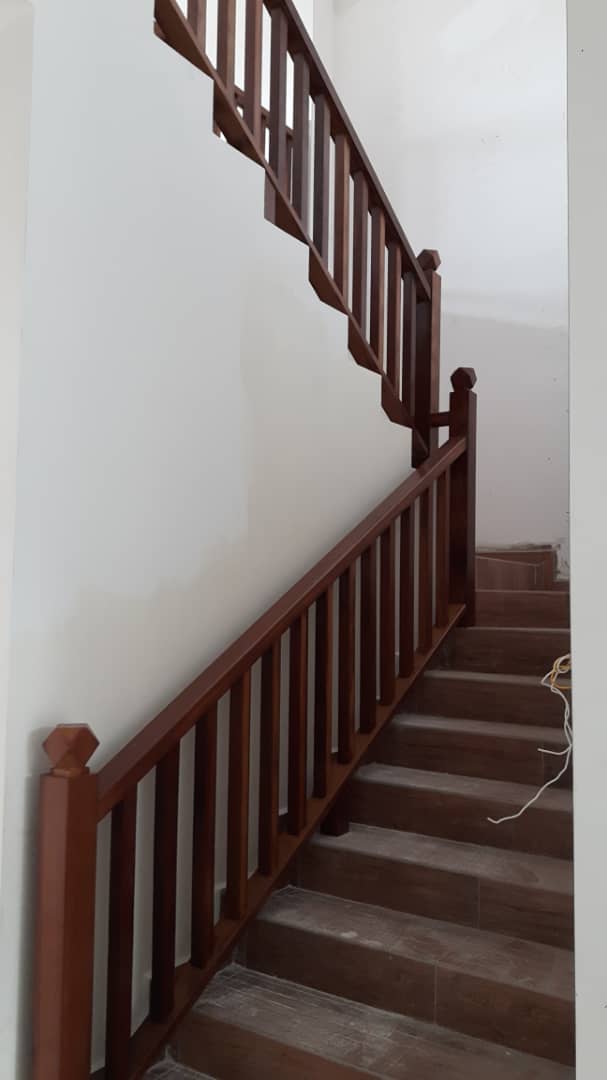 Solid wood staircase handrail and balusters